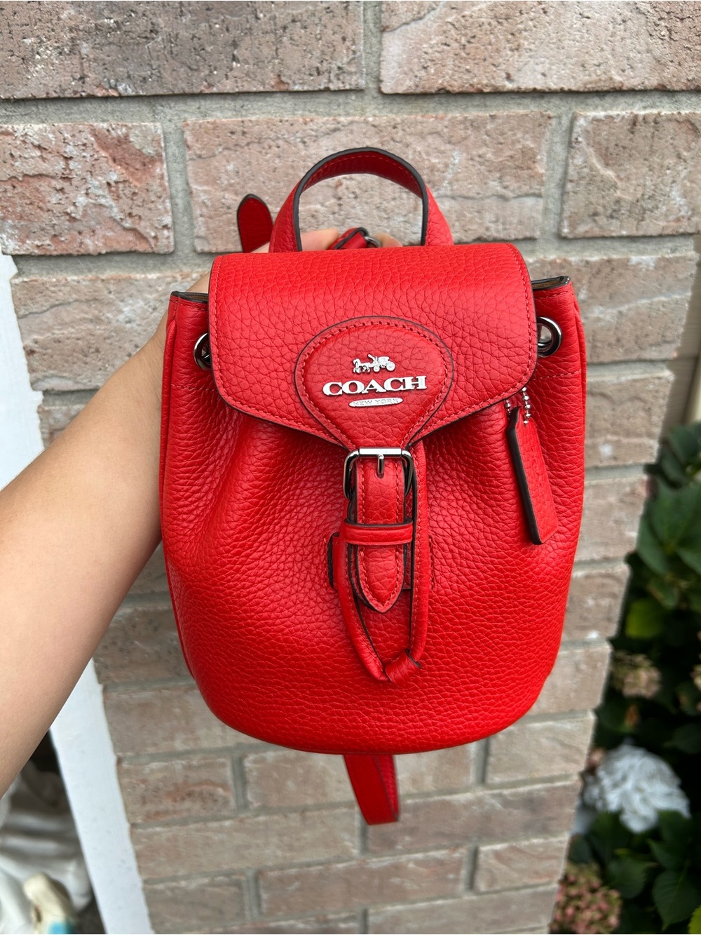 COACH Pebbled Leather Mini Backpack in Red